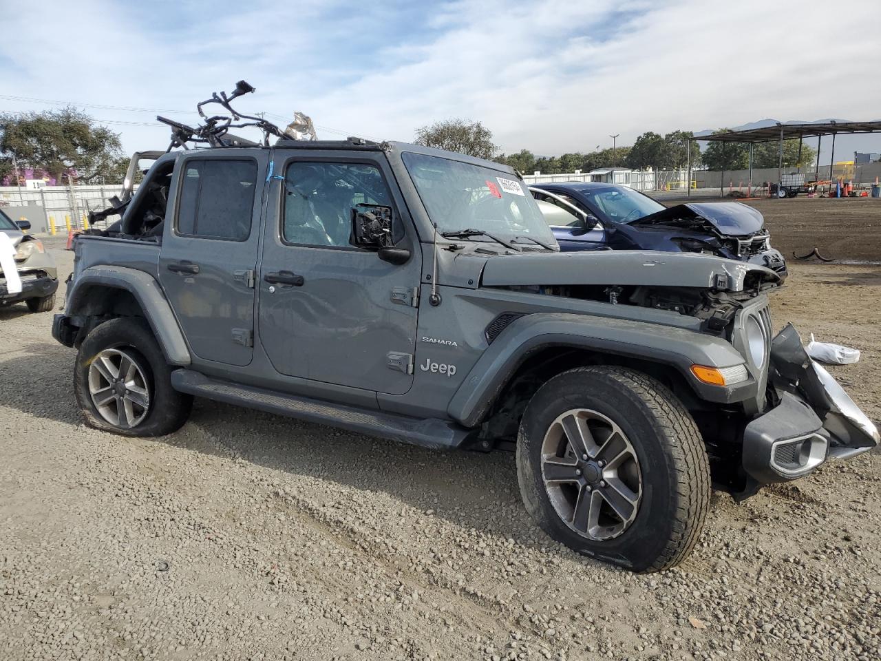 2019 Jeep Wrangler VIN 1C4HJXEN9KW519593 Copart auction photo, all over damage thumbnail 4
