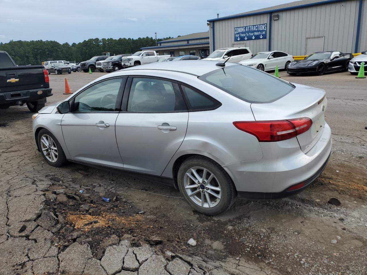 2016 Ford Focus VIN 1FADP3F24GL386556 Copart auction photo, side / front end damage thumbnail 2