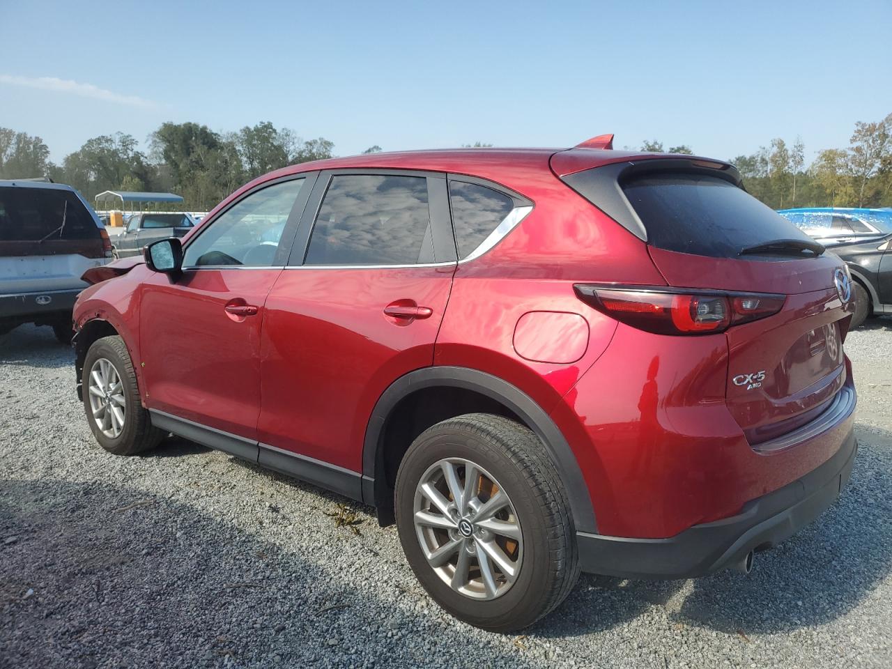 2023 Mazda CX-5 VIN JM3KFBCM0P0207717 Copart auction photo, front end / minor dent/scratches damage thumbnail 2