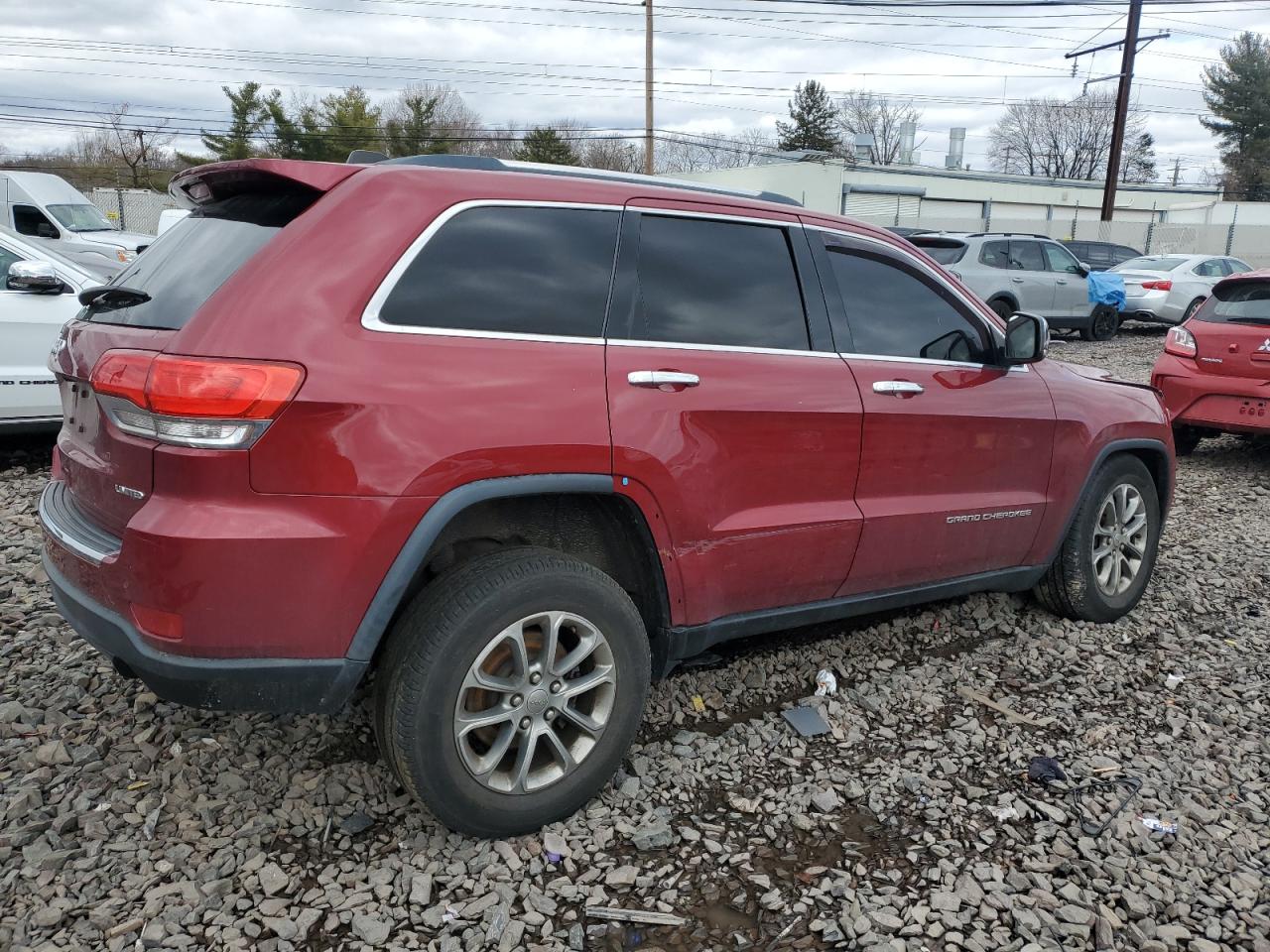 2015 Jeep Grand Cherokee VIN 1C4RJFBG4FC214725 Copart auction photo, front end / side damage thumbnail 3