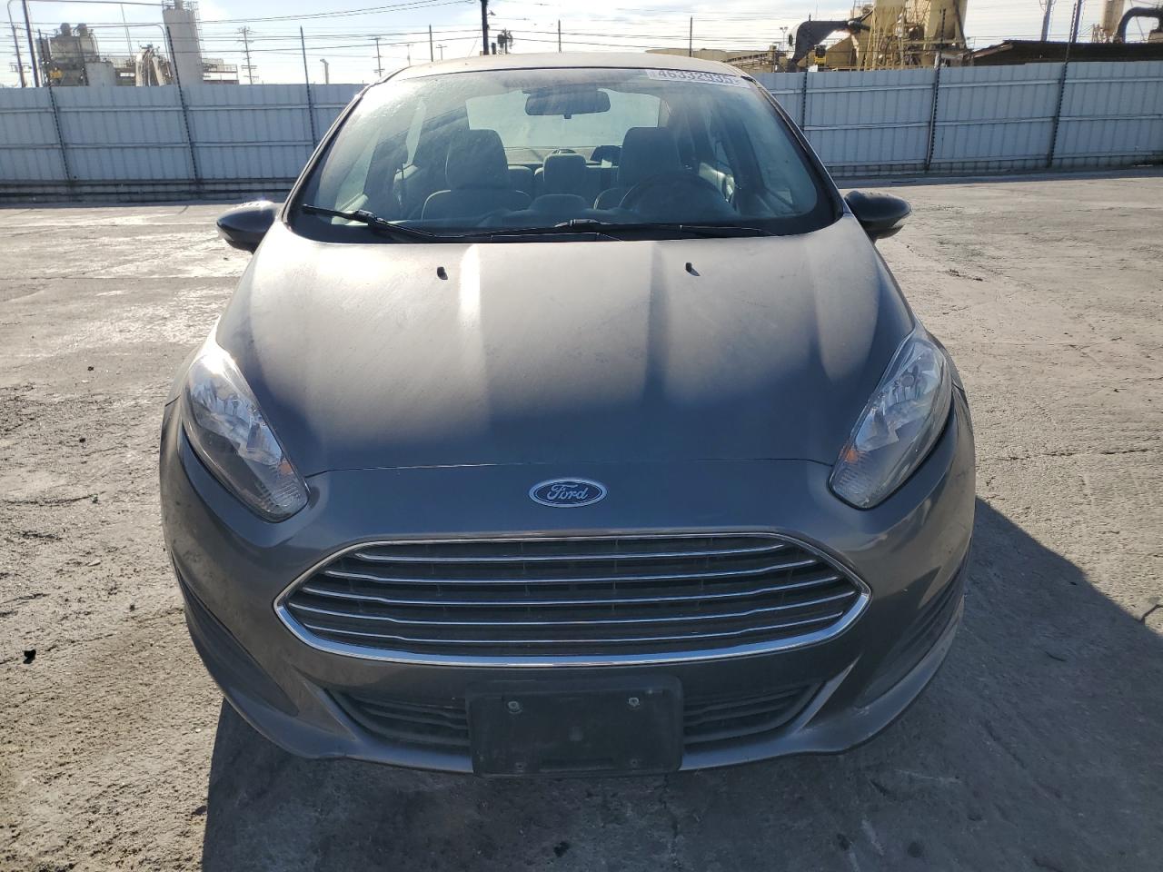 2015 Ford Fiesta VIN 3FADP4BJ8FM133546 Copart auction photo, minor dent/scratches / damage history damage thumbnail 5