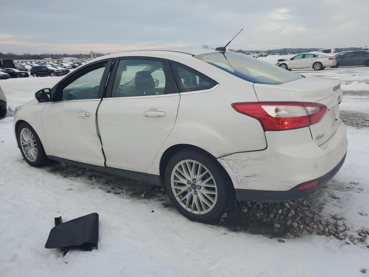 2012 Ford Focus VIN 1FAHP3H24CL129115 Copart auction photo, side / rear end damage thumbnail 2