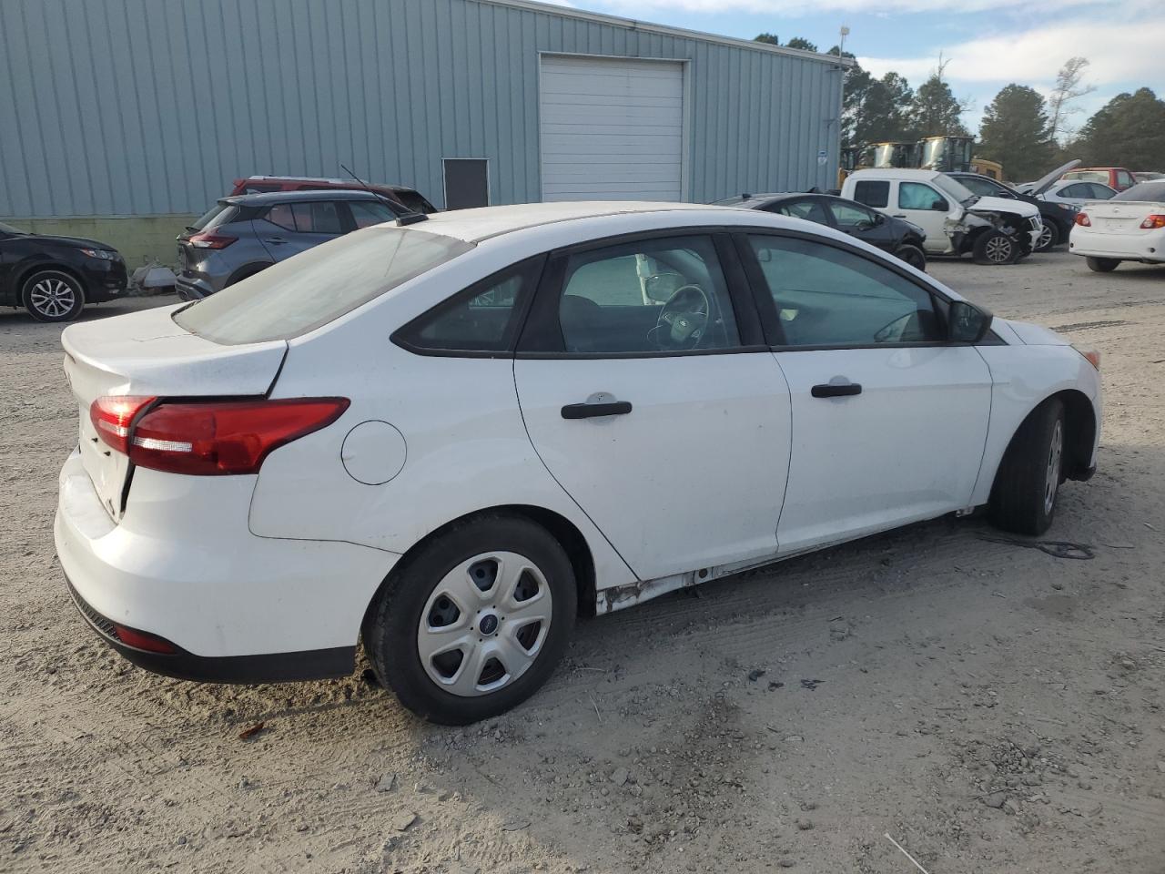 2016 Ford Focus VIN 1FADP3E24GL335687 Copart auction photo, rear end / minor dent/scratches damage thumbnail 3