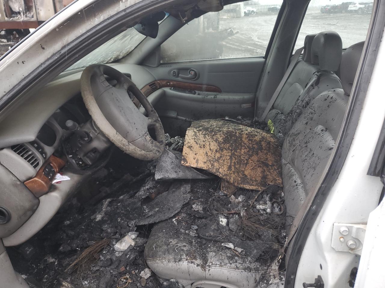 2000 Buick LeSabre VIN 1G4HR54K1YU306836 Copart auction photo, burn damage thumbnail 7