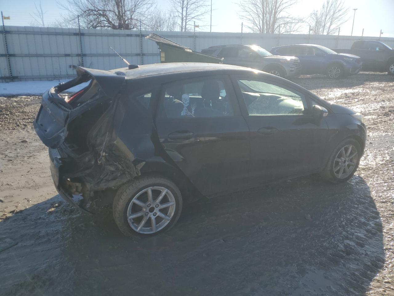 2016 Ford Fiesta VIN 3FADP4EJ7GM158063 Copart auction photo, rear end damage thumbnail 3