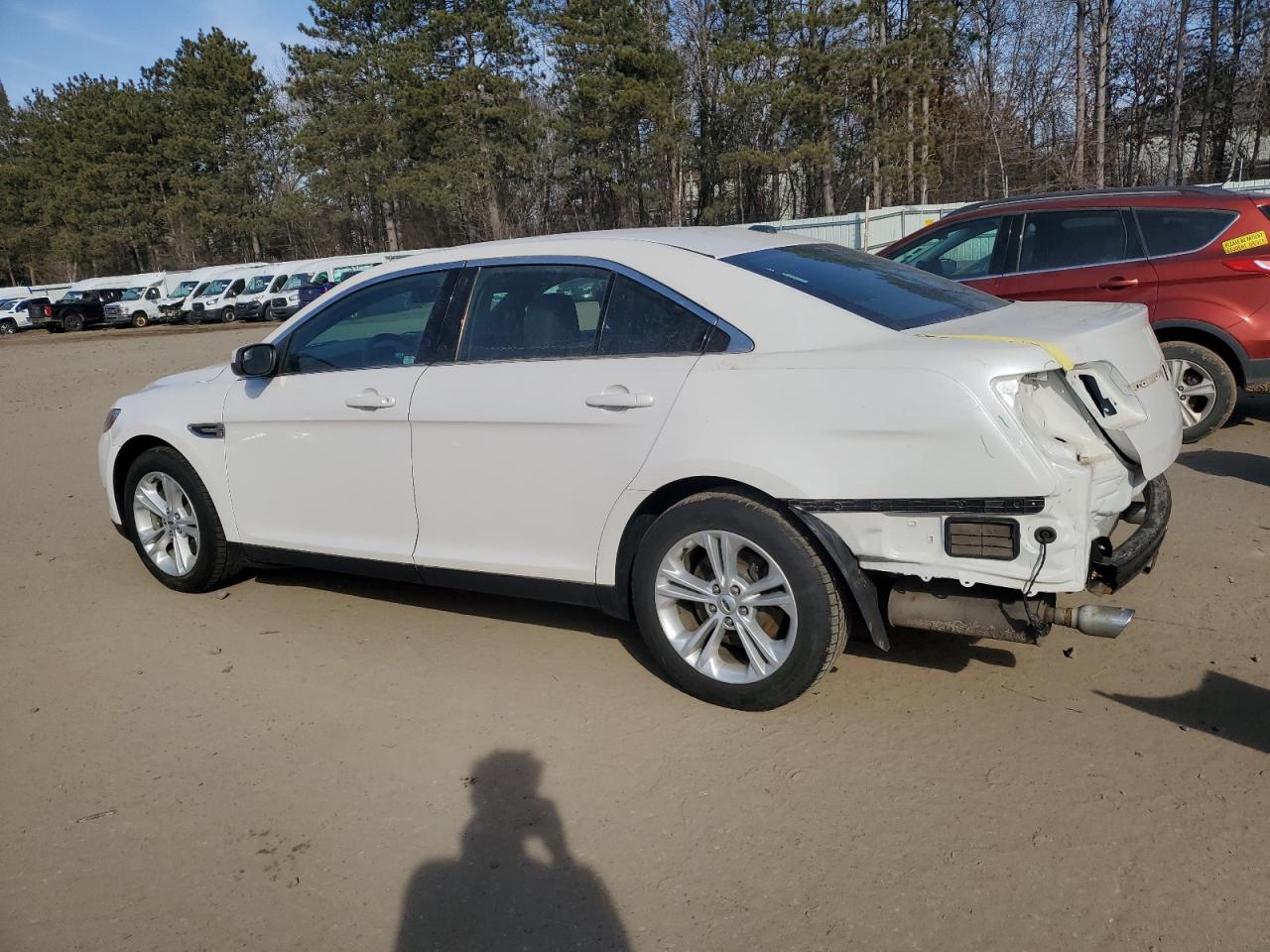 2015 Ford Taurus VIN 1FAHP2E85FG189582 Copart auction photo, rear end damage thumbnail 2