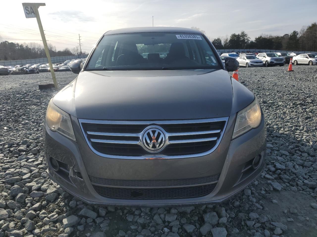 2010 Volkswagen Tiguan VIN WVGAV7AX1AW529008 Copart auction photo, front end / side damage thumbnail 5