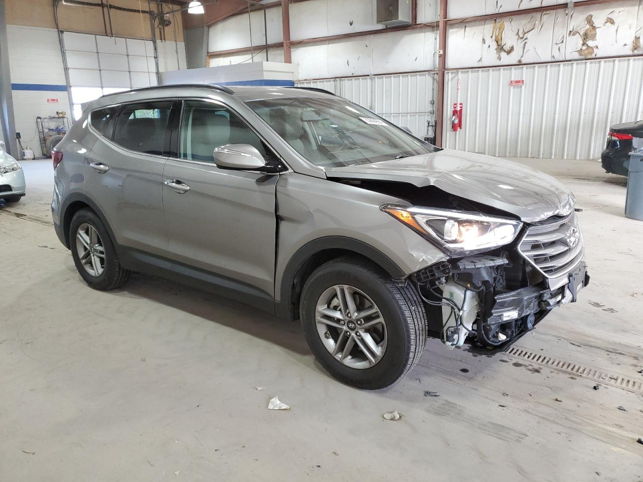 2017 Hyundai Santa Fe VIN 5NMZU3LB7HH031557 Copart auction photo, front end damage thumbnail 4