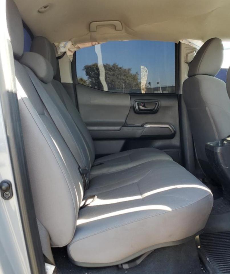 2019 Toyota Tacoma VIN 5TFAX5GN1KX144312 Copart auction photo, all over damage thumbnail 10