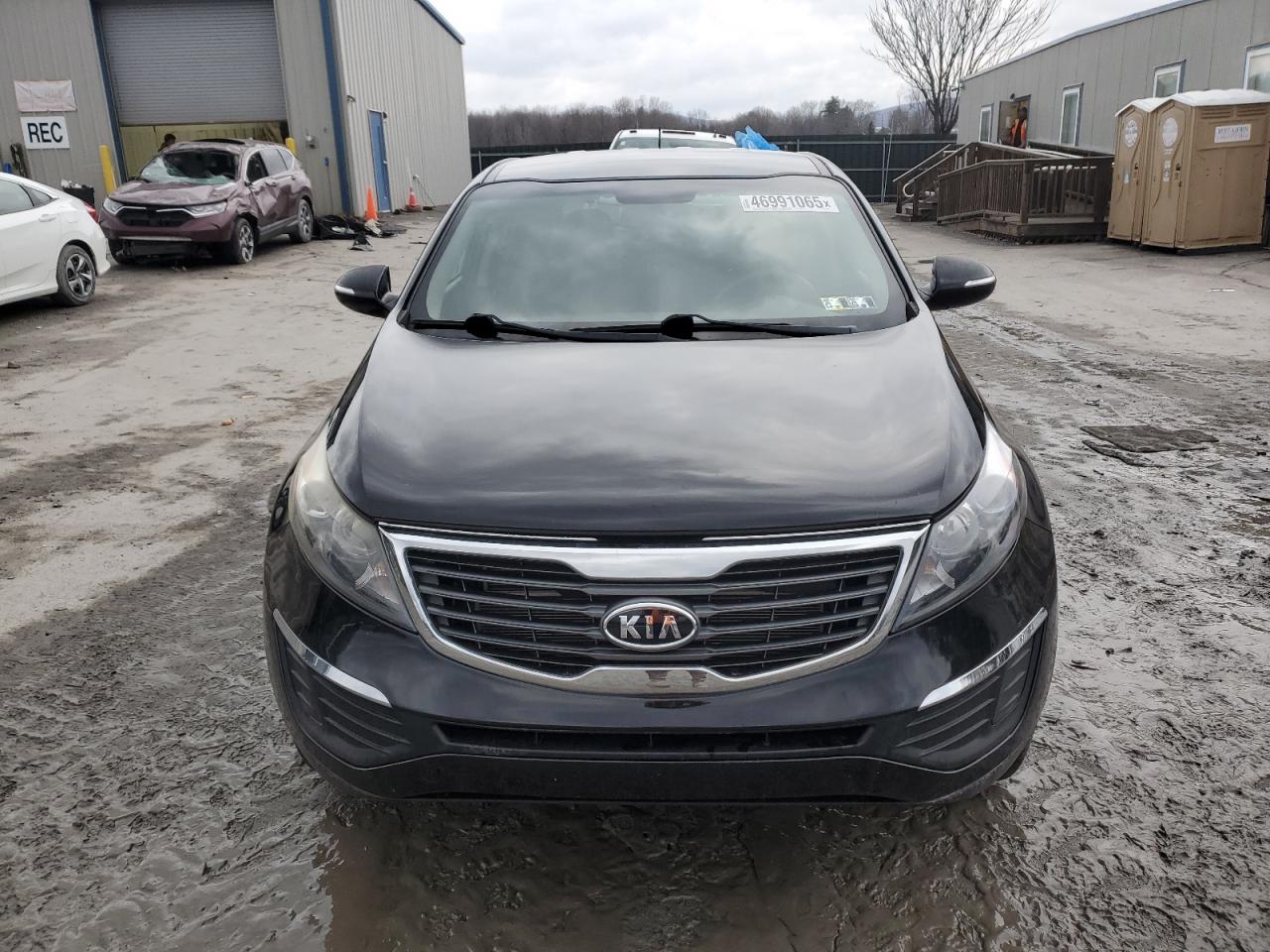 2012 KIA Sportage VIN KNDPBCA21C7209947 Copart auction photo, side / rear end damage thumbnail 5