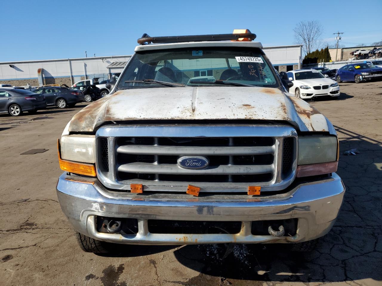 1999 Ford F250 VIN 1FTNX21L0XEB46210 Copart auction photo, side / rear end damage thumbnail 5