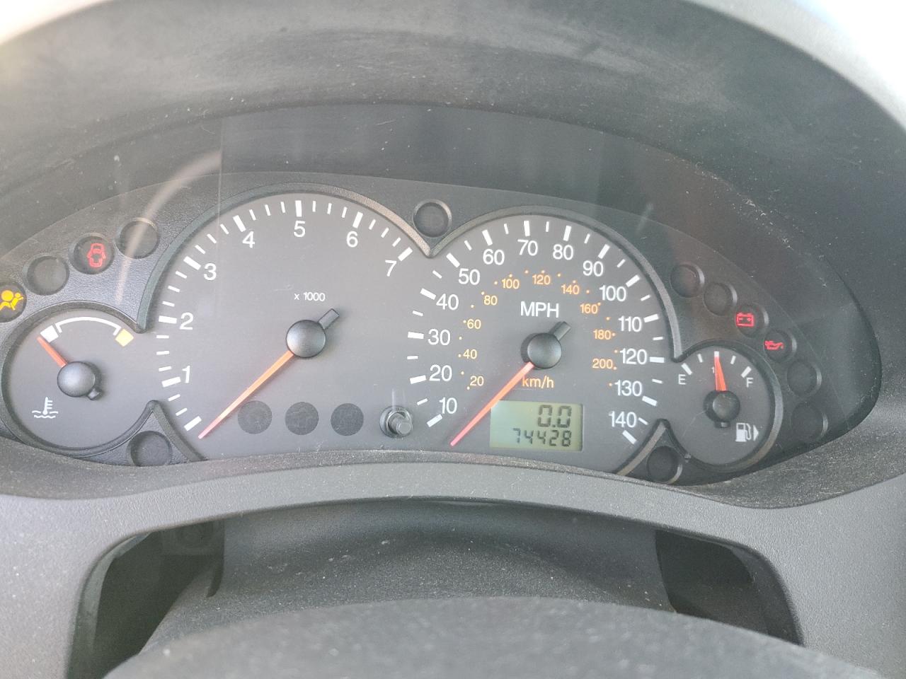 2005 Ford Focus VIN 3FAFP37N05R131645 Copart auction photo, side / all over damage thumbnail 9