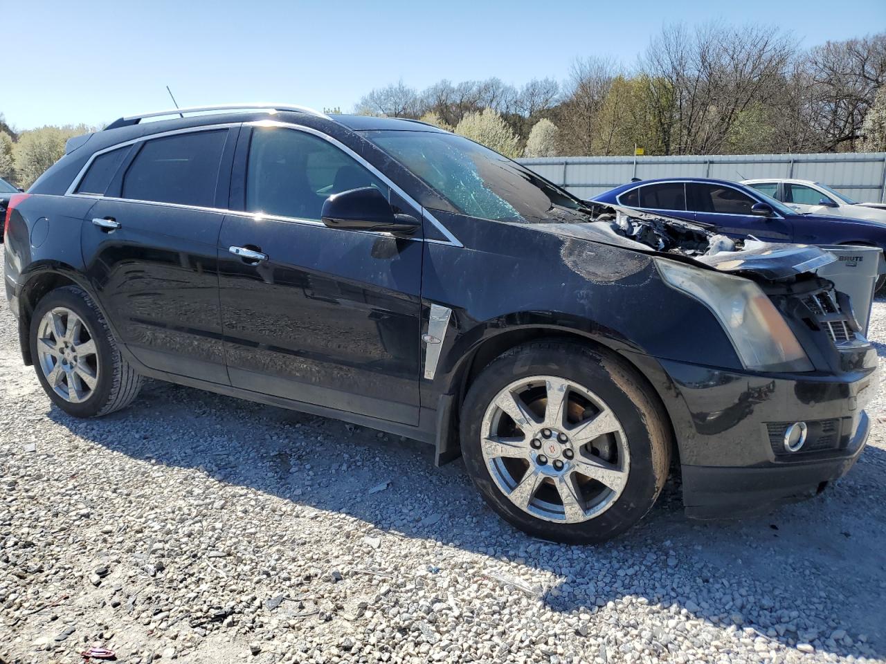 2012 Cadillac SRX VIN 3GYFNFE38CS659968 Copart auction photo, burn - engine damage thumbnail 4