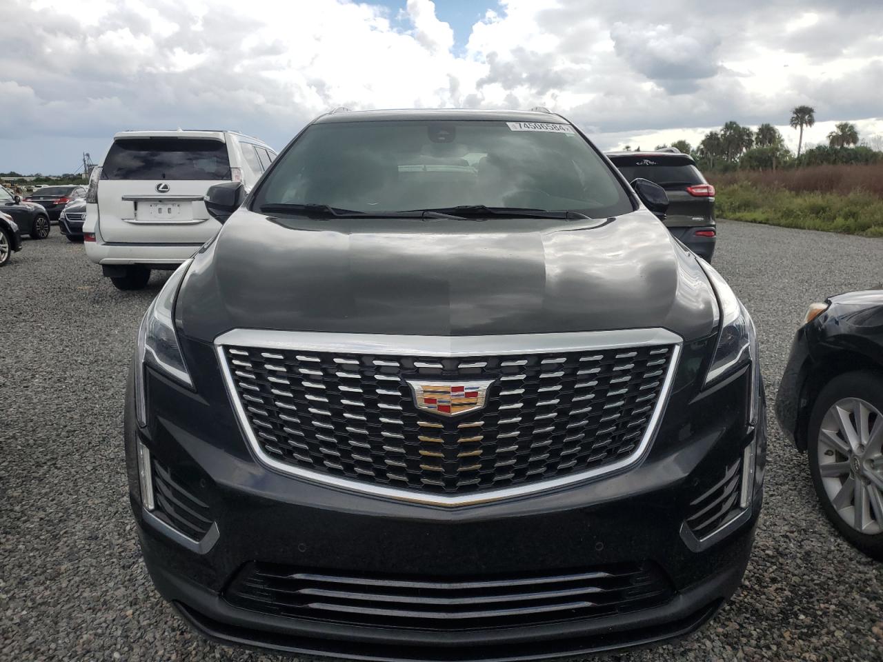 2022 Cadillac XT5 VIN 1GYKNAR49NZ159814 Copart auction photo, water/flood damage thumbnail 5