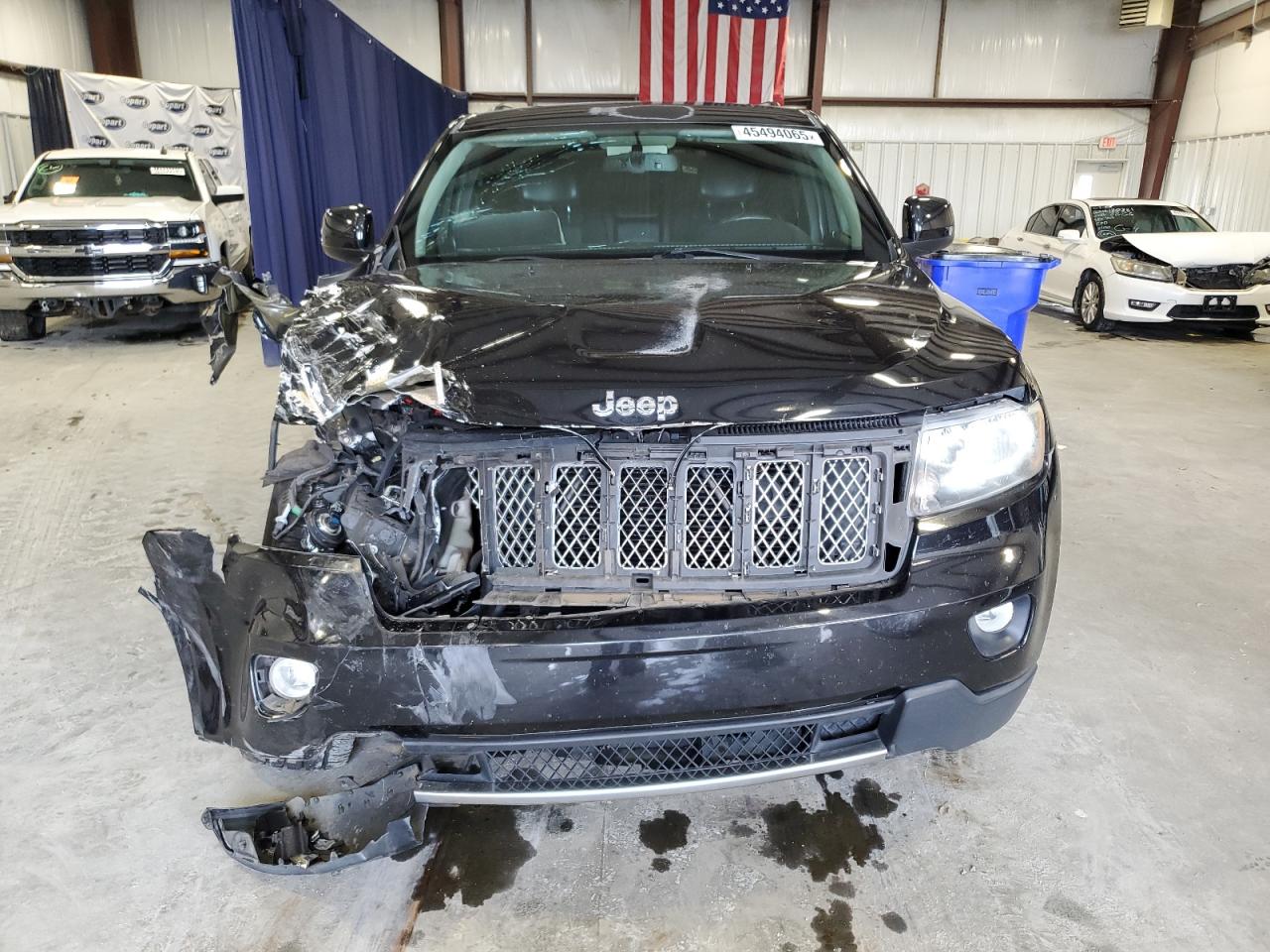2012 Jeep Grand Cherokee VIN 1C4RJEAT1CC361640 Copart auction photo, front end damage thumbnail 5