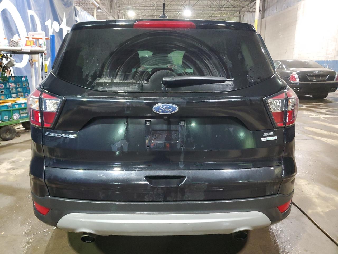 2017 Ford Escape VIN 1FMCU0GD5HUD51559 Copart auction photo, minor dent/scratches damage thumbnail 6