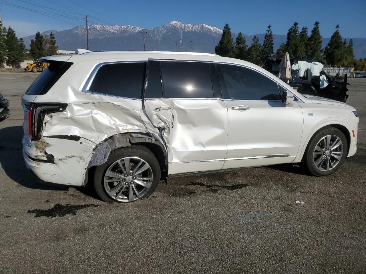 2022 Cadillac XT6 VIN 1GYKPFRS5NZ125360 Copart auction photo, side / rear end damage thumbnail 3