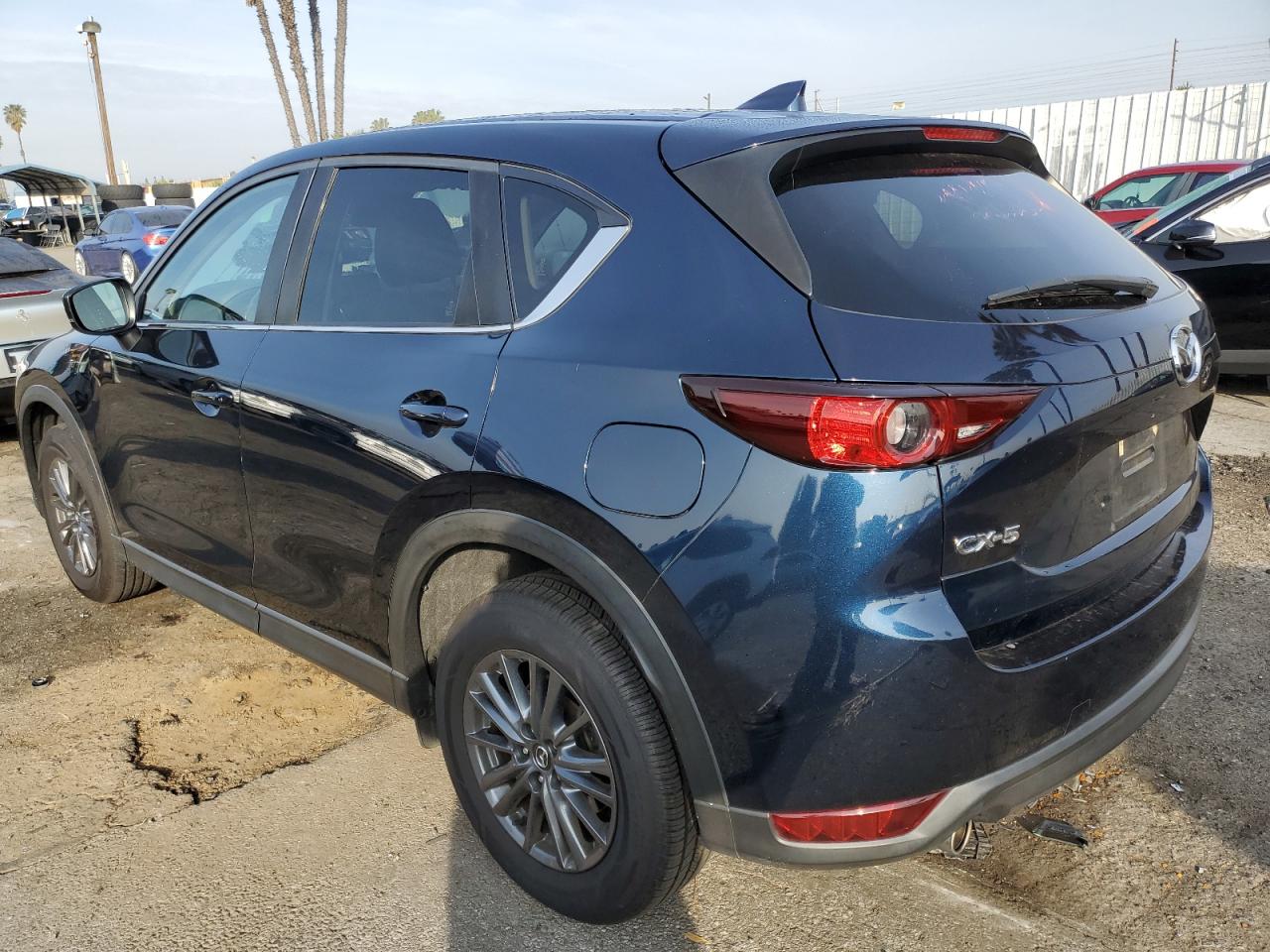 2020 Mazda CX-5 VIN JM3KFACM4L0860328 Copart auction photo, side / minor dent/scratches damage thumbnail 2