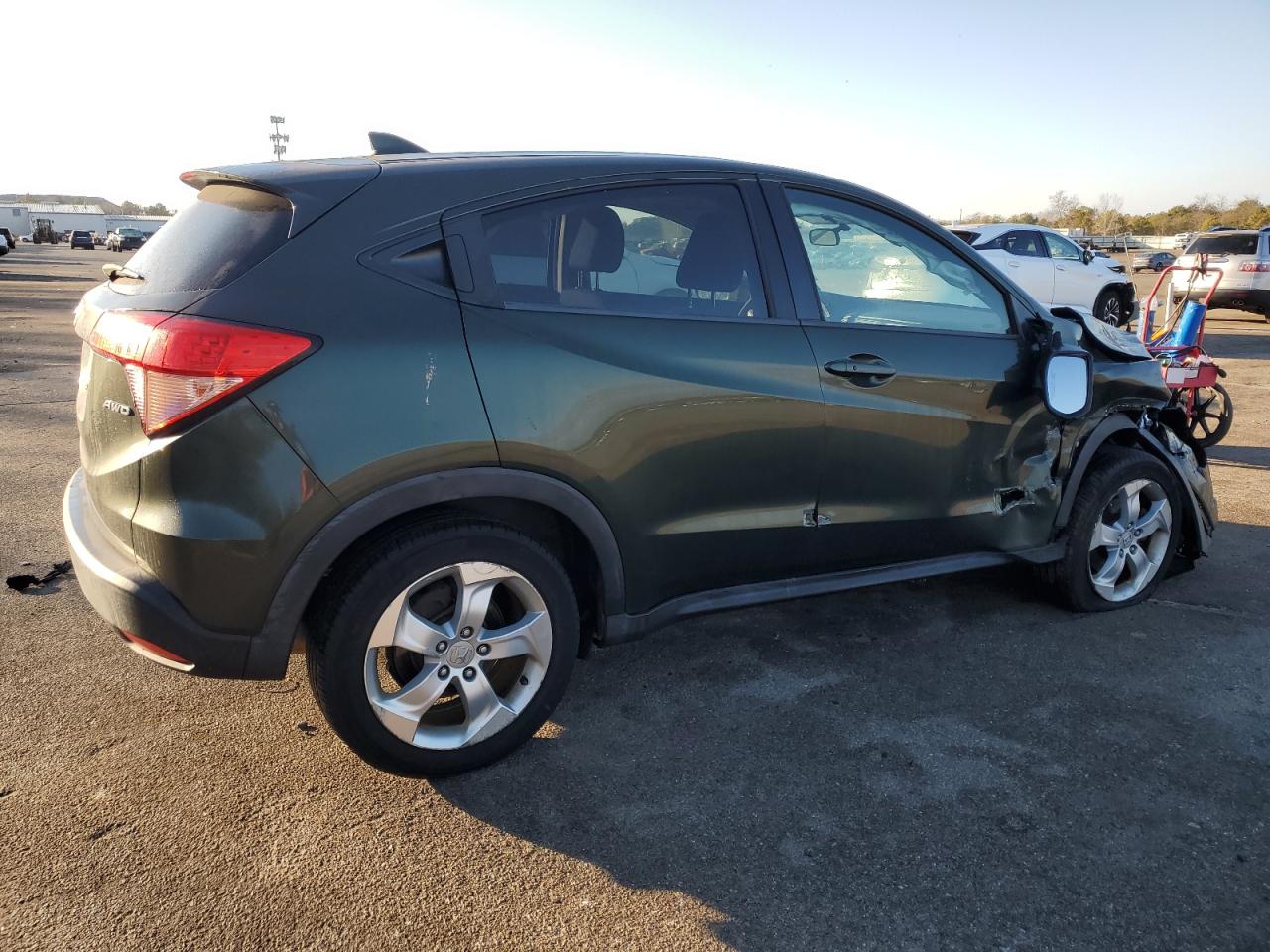 2016 Honda HR-V VIN 3CZRU6H51GM742374 Copart auction photo, front end / side damage thumbnail 3