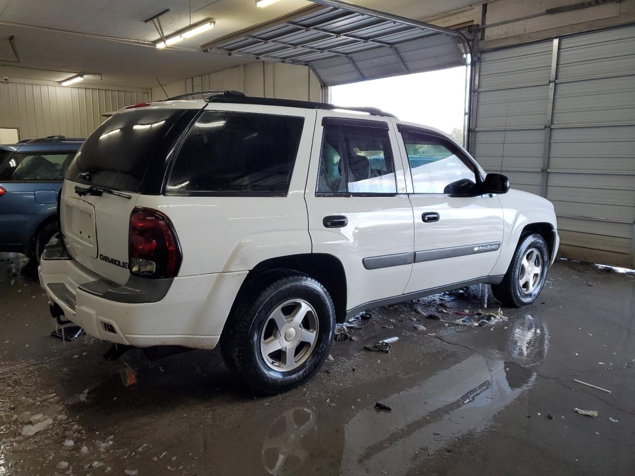 2004 Chevrolet TrailBlazer VIN 1GNDS13S642165230 Copart auction photo, side / undercarriage damage thumbnail 3