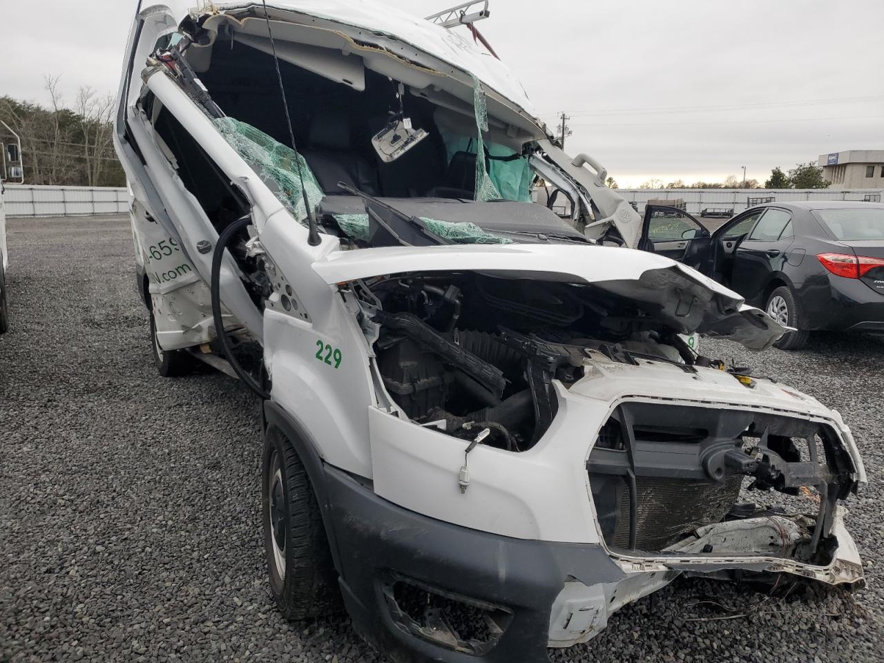 2022 Ford Transit VIN 1FTBR1C82NKA18176 Copart auction photo, front end / side damage thumbnail 4