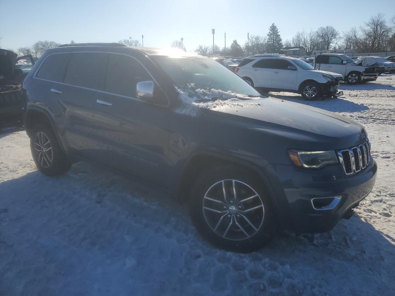 2019 Jeep Grand Cherokee VIN 1C4RJFBG6KC750022 Copart auction photo, front end / side damage thumbnail 4