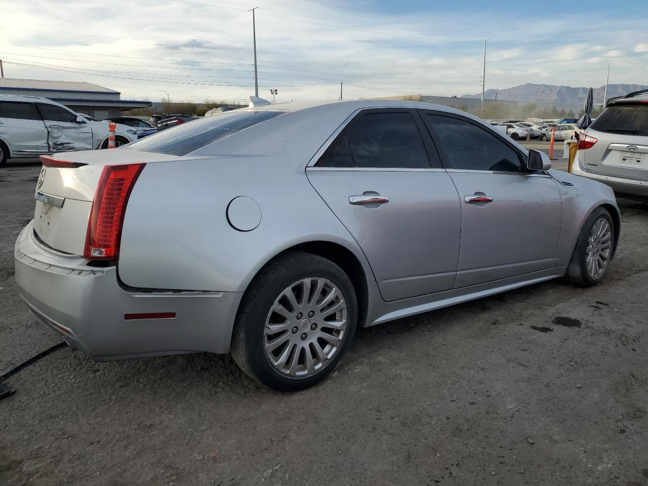2010 Cadillac CTS VIN 1G6DJ5EV8A0102277 Copart auction photo, side / rear end damage thumbnail 3