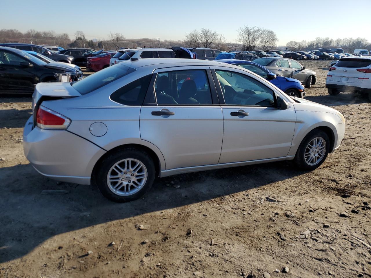 2009 Ford Focus VIN 1FAHP35N09W147794 Copart auction photo, side / rear end damage thumbnail 3