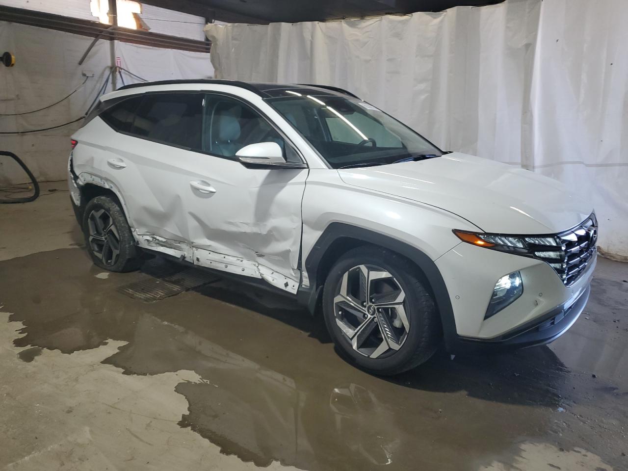 2022 Hyundai Tucson VIN 5NMJECAE1NH104635 Copart auction photo, all over damage thumbnail 4