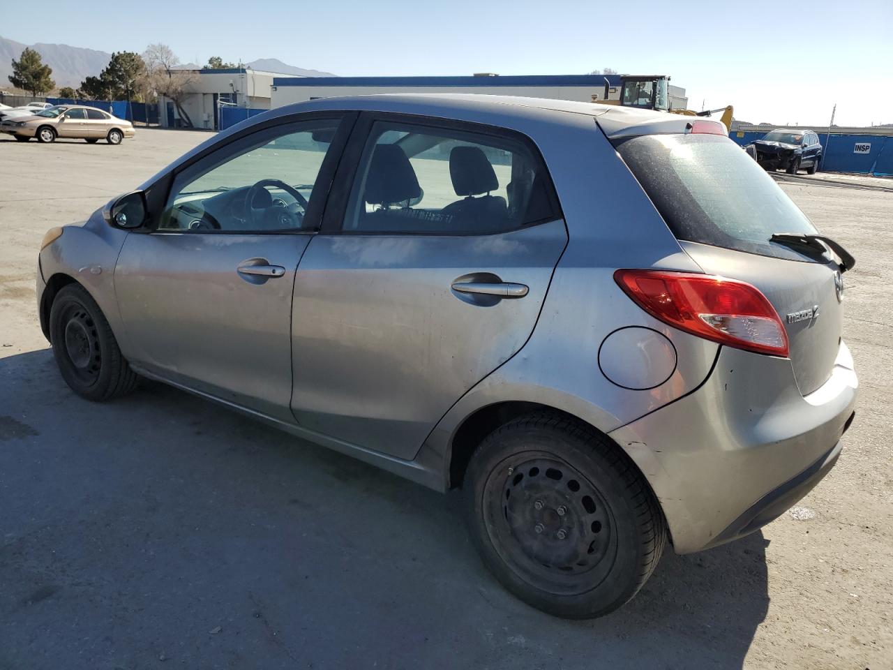 2012 Mazda 2 VIN JM1DE1KZ6C0145410 Copart auction photo, rear end / minor dent/scratches damage thumbnail 2