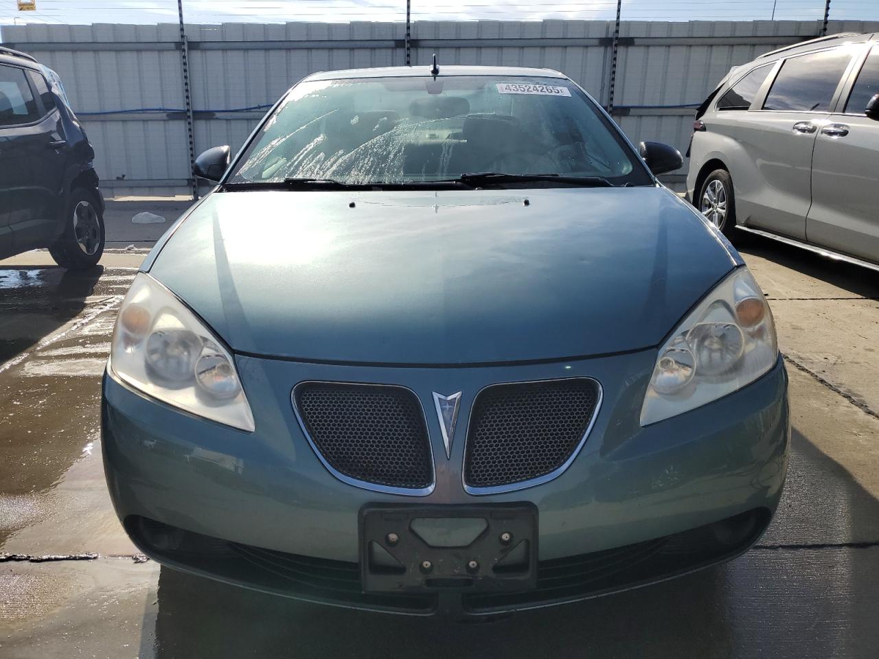 2009 Pontiac G6 VIN 1G2ZG57B494136617 Copart auction photo, undercarriage / minor dent/scratches damage thumbnail 5