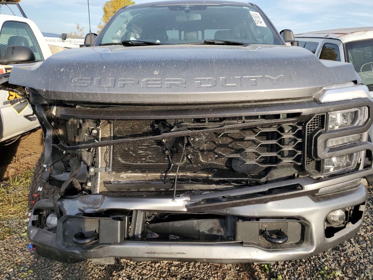 2023 Ford F250 VIN 1FT8W2BT7PEC15098 Copart auction photo, front end / side damage thumbnail 11