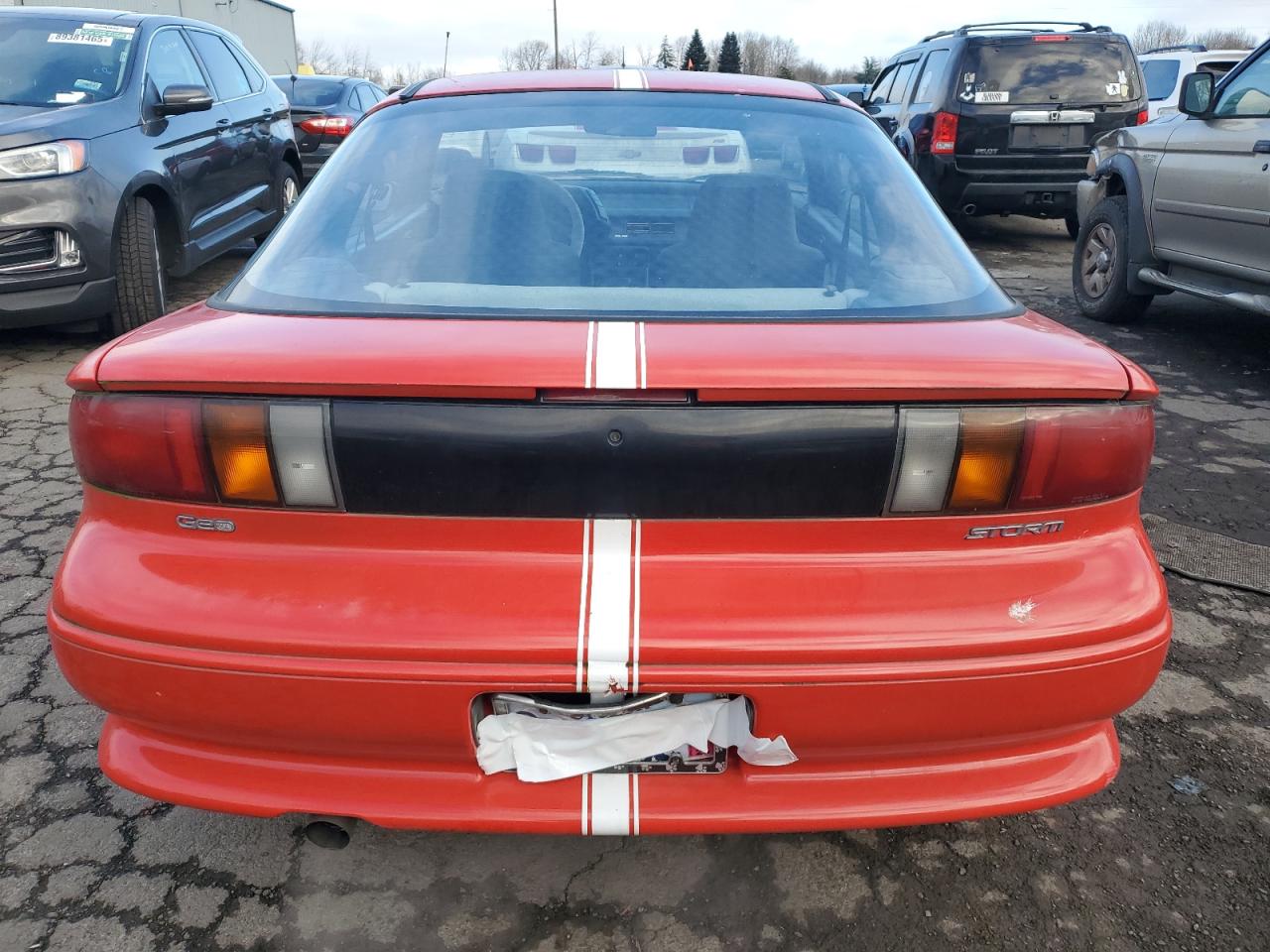 1992 GEO Storm VIN J81RF236XN7557493 Copart auction photo, side damage thumbnail 6
