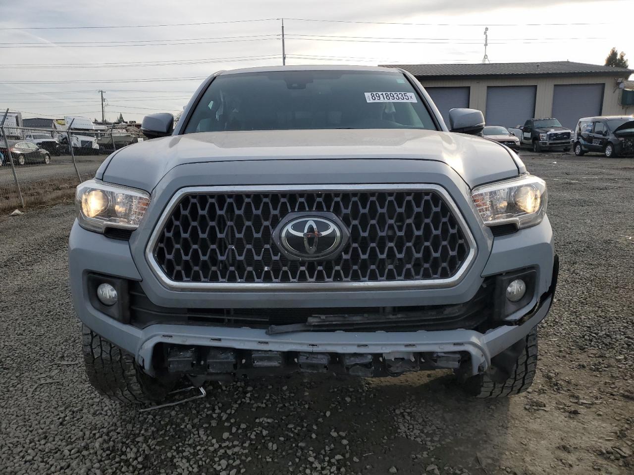 2019 Toyota Tacoma VIN 3TMCZ5AN3KM210361 Copart auction photo, front end / side damage thumbnail 5