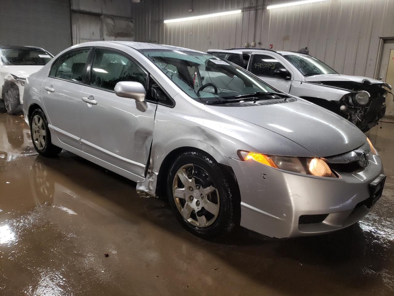 2010 Honda Civic VIN 2HGFA1F55AH300325 Copart auction photo, side / front end damage thumbnail 4