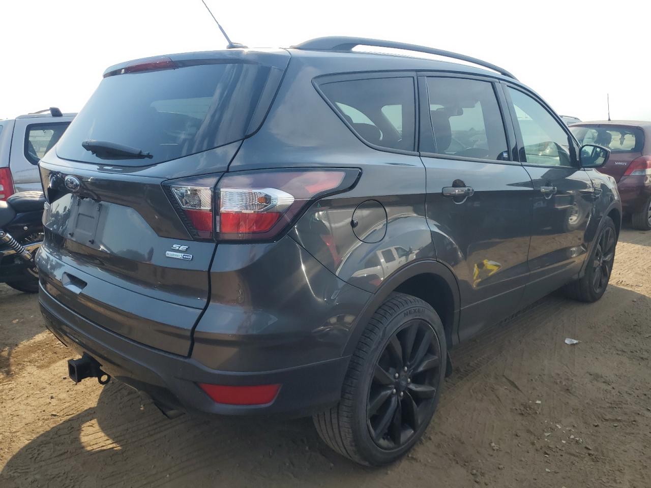2018 Ford Escape VIN 1FMCU9GD7JUC76700 Copart auction photo, rear end / side damage thumbnail 3