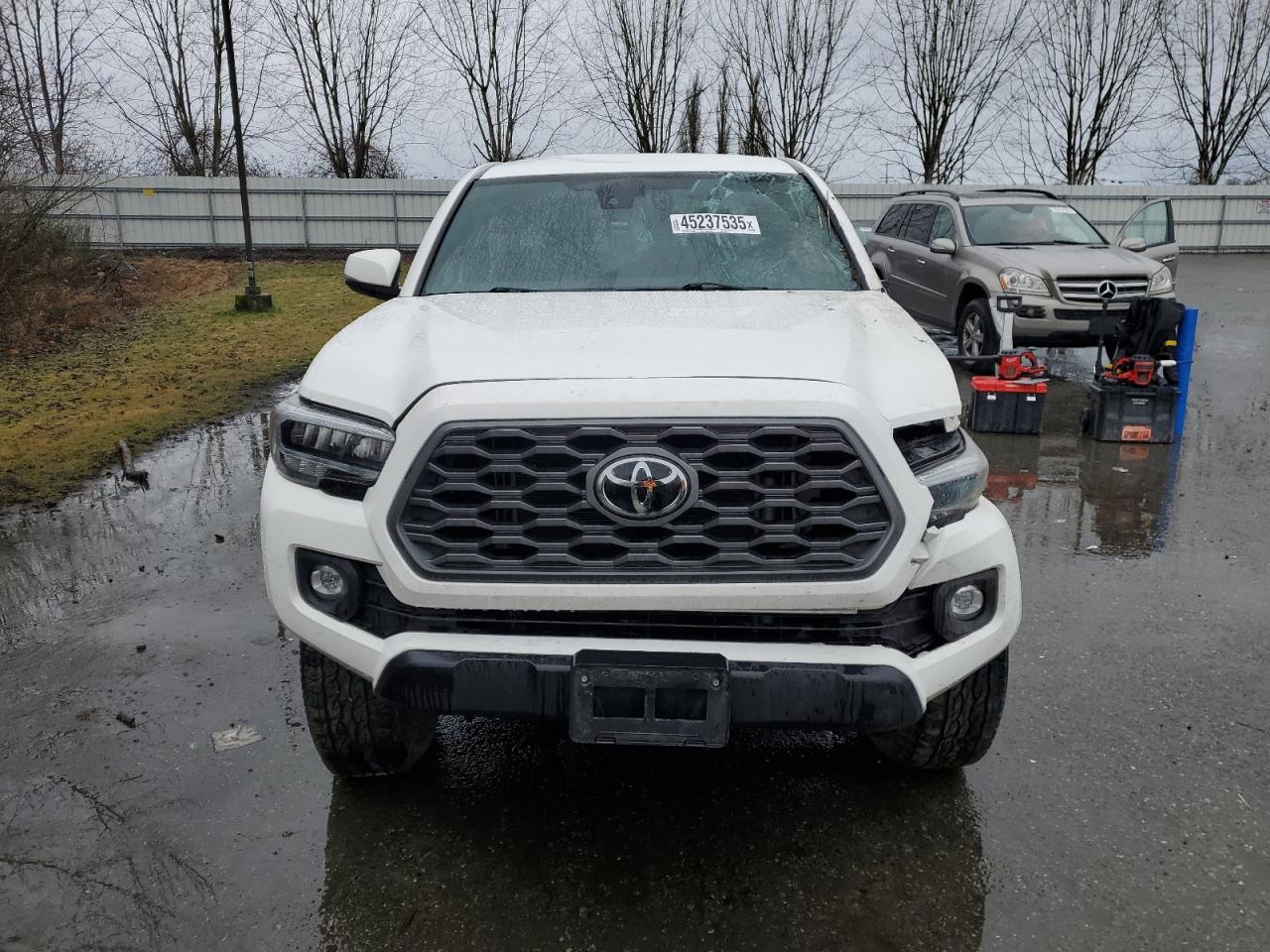 2023 Toyota Tacoma VIN 3TMDZ5BN1PM166936 Copart auction photo, front end / rear end damage thumbnail 5