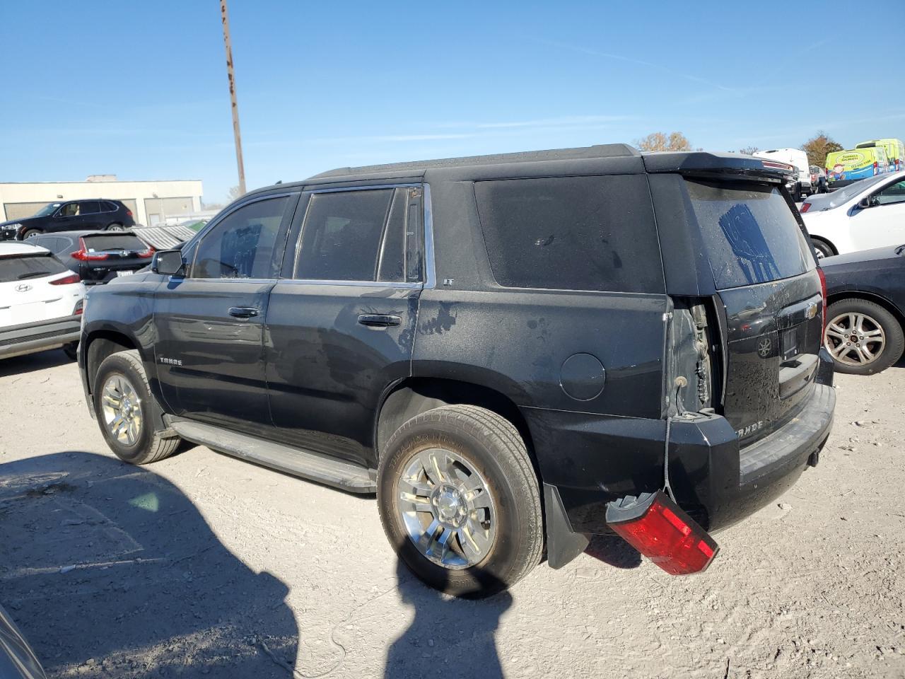 2015 Chevrolet Tahoe VIN 1GNSKBKC7FR161334 Copart auction photo, rear end / side damage thumbnail 2