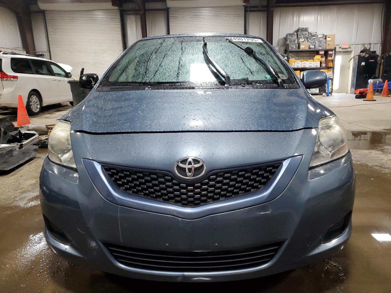 2012 Toyota Yaris VIN JTDBT4K31CL021862 Copart auction photo, side / front end damage thumbnail 5