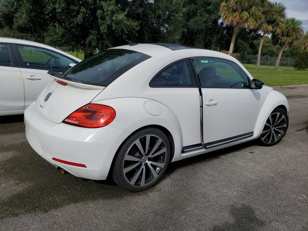 2012 Volkswagen Beetle VIN 3VWV67ATXCM645274 Copart auction photo, water/flood damage thumbnail 3