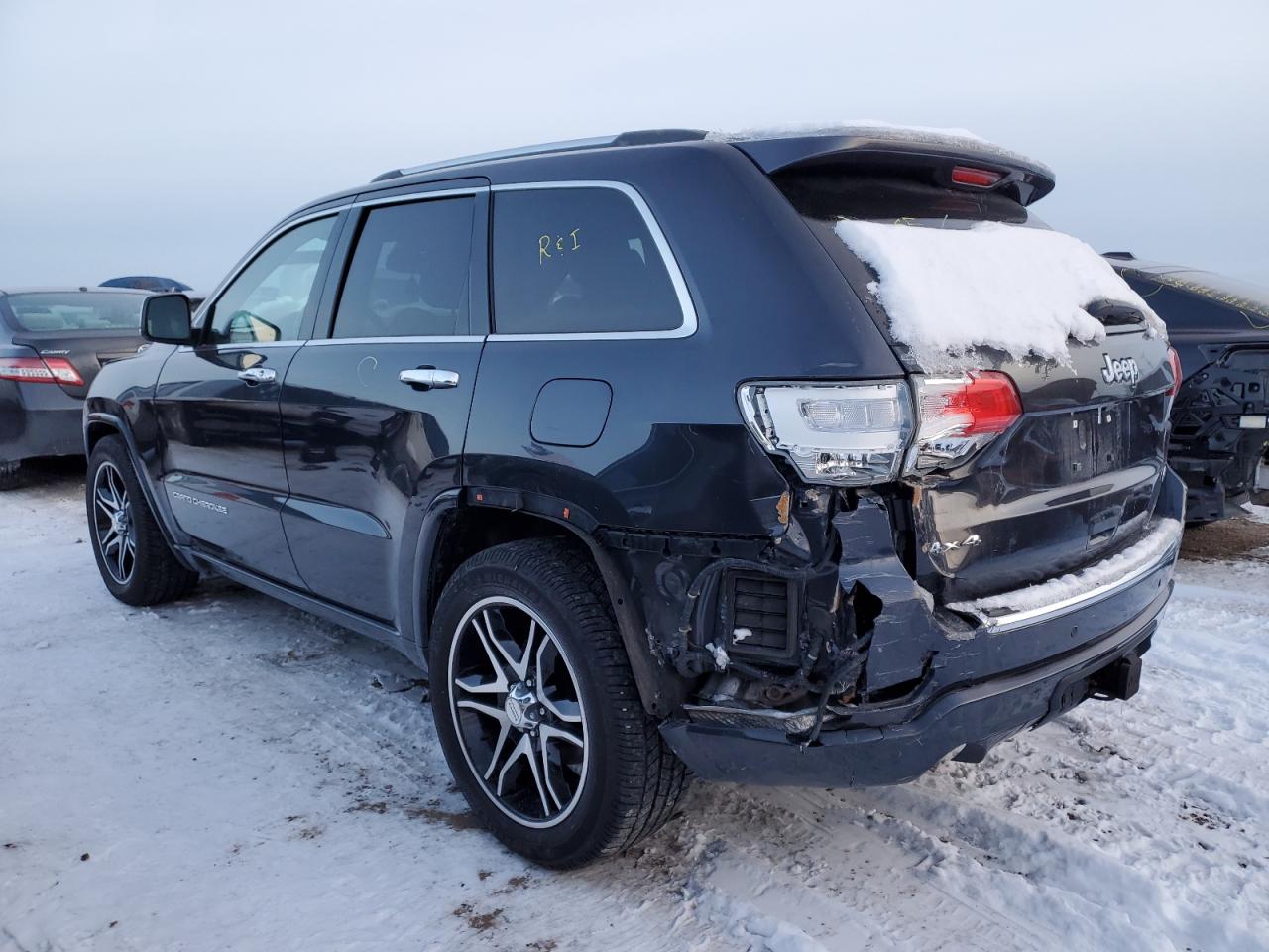 2015 Jeep Grand Cherokee VIN 1C4RJFCG6FC807291 Copart auction photo, rear end / minor dent/scratches damage thumbnail 2