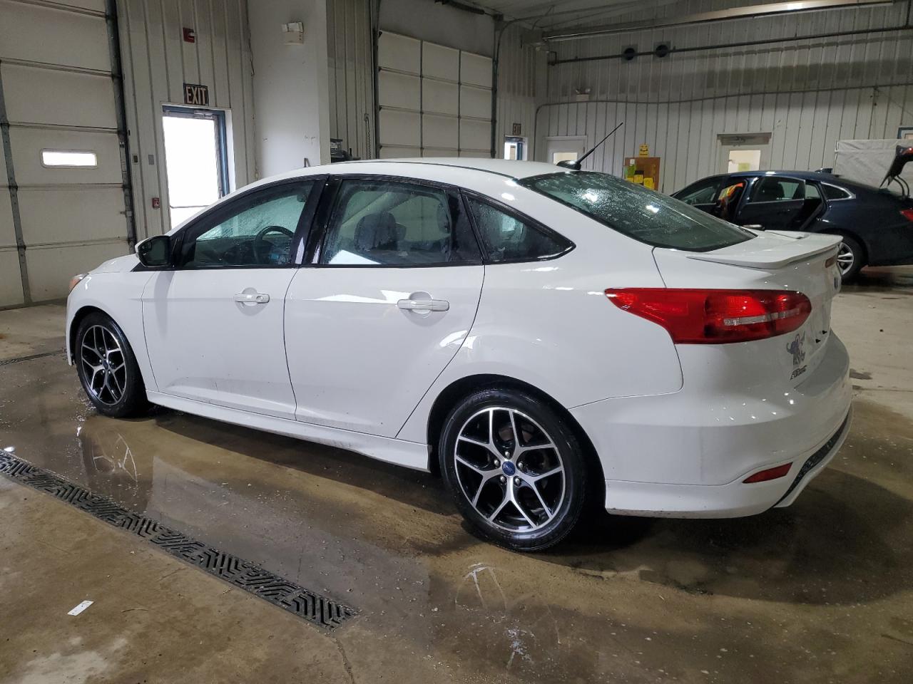 2016 Ford Focus VIN 1FADP3F20GL357359 Copart auction photo, side / front end damage thumbnail 2
