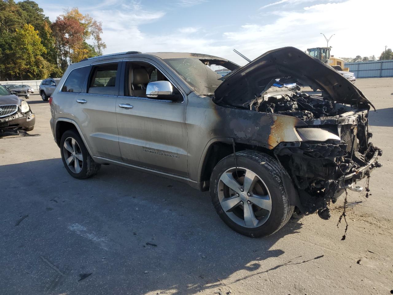 2014 Jeep Grand Cherokee VIN 1C4RJECG3EC380130 Copart auction photo, burn damage thumbnail 4