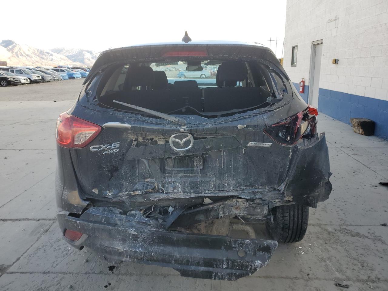 2016 Mazda CX-5 VIN JM3KE4CY7G0879078 Copart auction photo, front end / rear end damage thumbnail 6