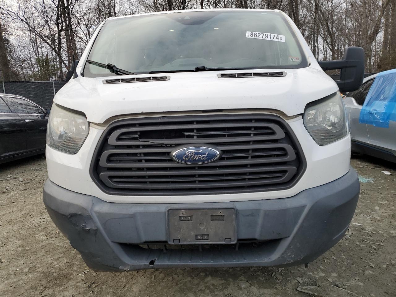 2015 Ford Transit VIN 1FTNR2YM5FKA32132 Copart auction photo, all over / undercarriage damage thumbnail 5