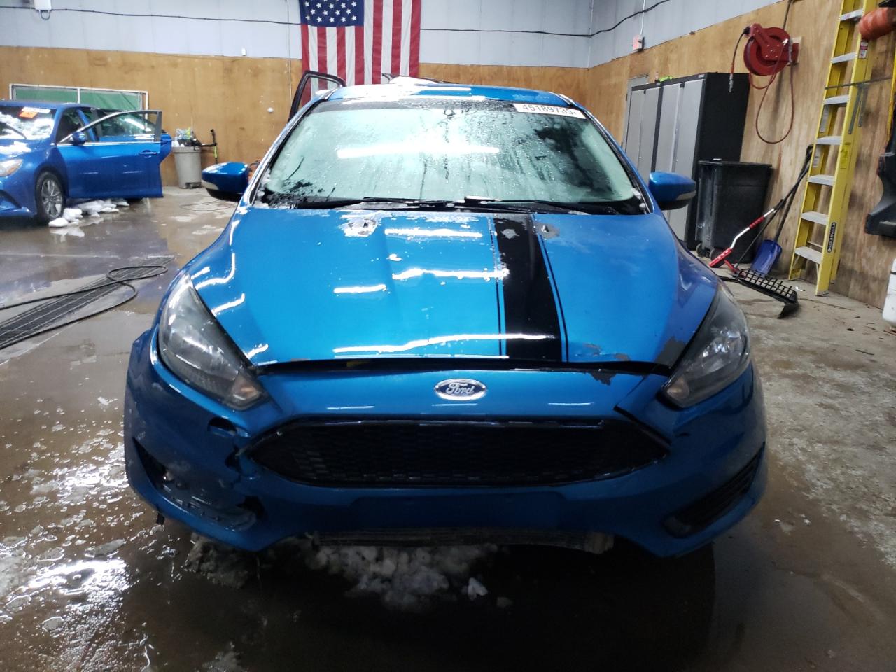 2016 Ford Focus VIN 1FADP3F25GL251263 Copart auction photo, front end / minor dent/scratches damage thumbnail 5