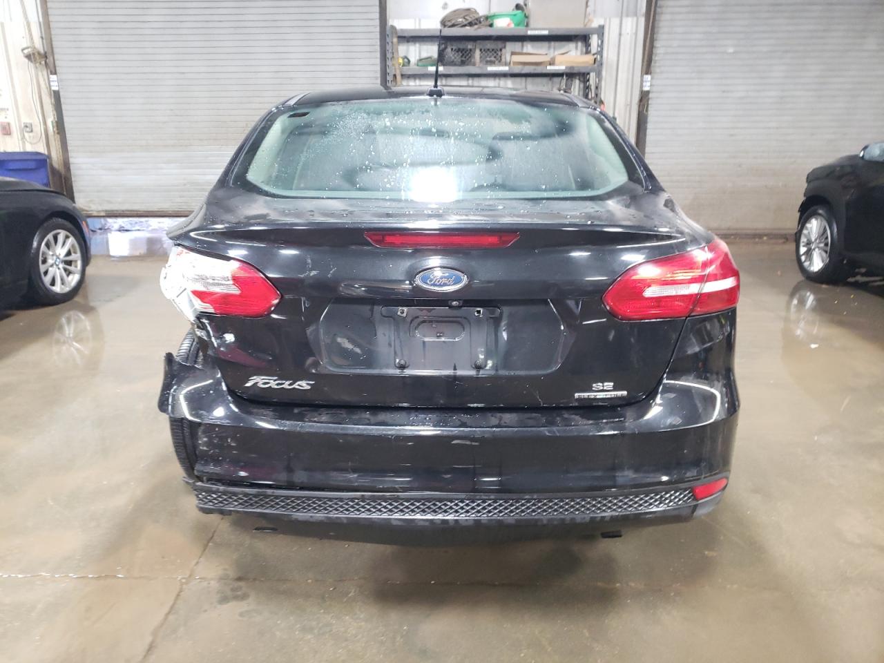 2015 Ford Focus VIN 1FADP3F2XFL202493 Copart auction photo, rear end damage thumbnail 6