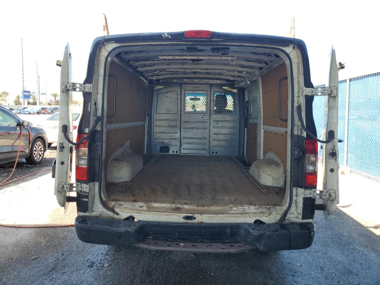2015 Nissan NV VIN 1N6BF0KY3FN808040 Copart auction photo, front end / side damage thumbnail 6