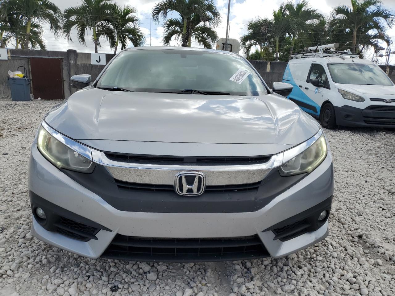 2016 Honda Civic VIN 19XFC1F35GE038110 Copart auction photo, rear end damage thumbnail 5