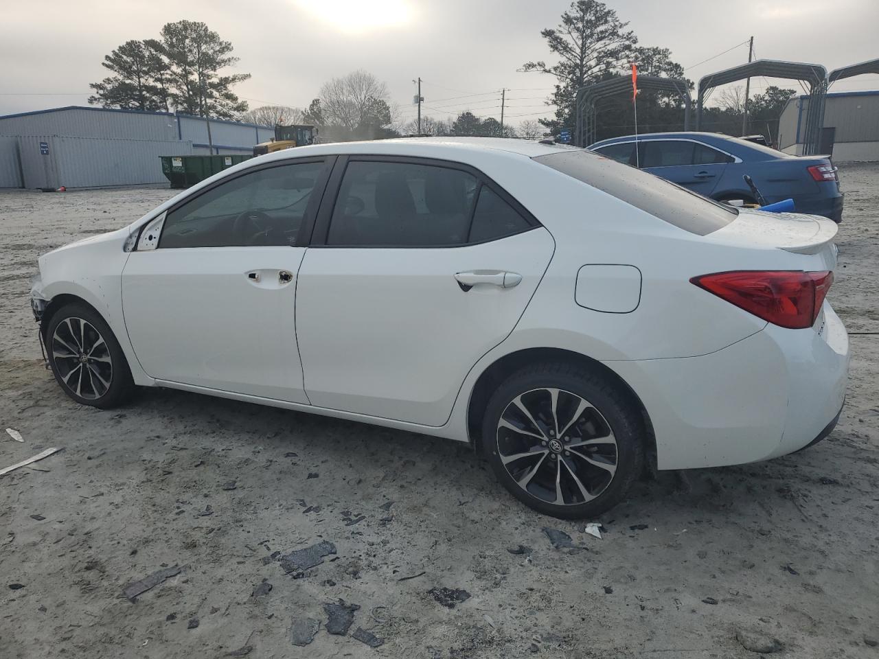 2018 Toyota Corolla VIN 5YFBURHE3JP743017 Copart auction photo, front end / side damage thumbnail 2